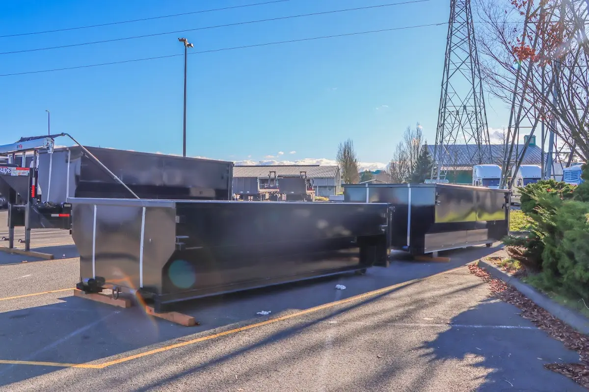 Roll-off dumpster ready for waste disposal at job site for Construction Dumpster Rental in Stow